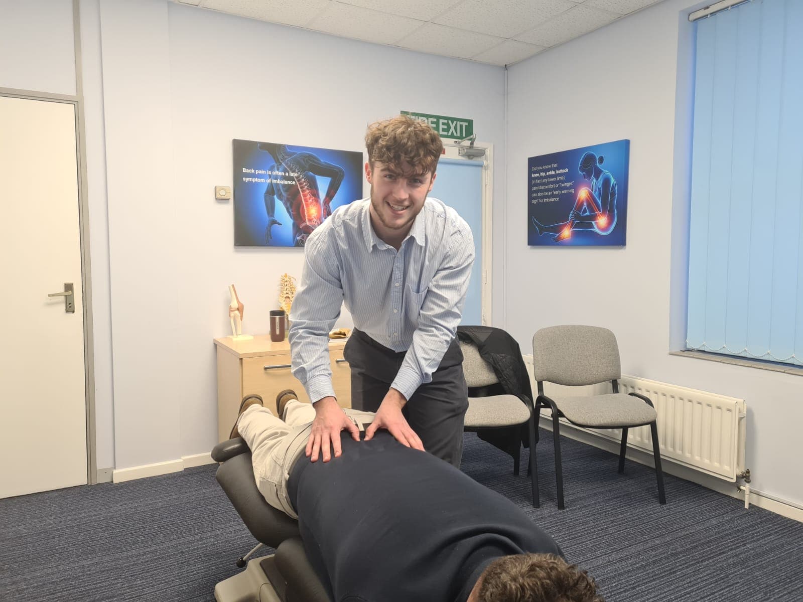 Dr Joe Sanyal treating a patient at Frameworks Clinic in Verwood